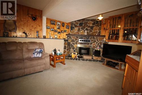 573 3Rd Street W, Shaunavon, SK - Indoor Photo Showing Living Room With Fireplace
