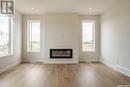 275 Prasad Manor, Saskatoon, SK  - Indoor Photo Showing Living Room With Fireplace 