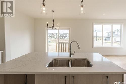 275 Prasad Manor, Saskatoon, SK - Indoor Photo Showing Kitchen With Double Sink