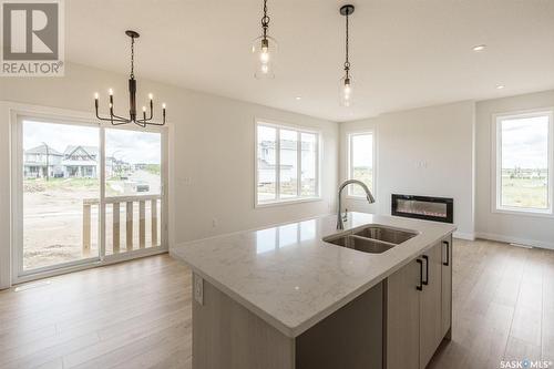 275 Prasad Manor, Saskatoon, SK - Indoor Photo Showing Kitchen With Double Sink