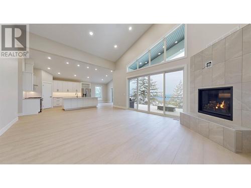 337 Mule Deer Drive, Osoyoos, BC - Indoor Photo Showing Living Room With Fireplace