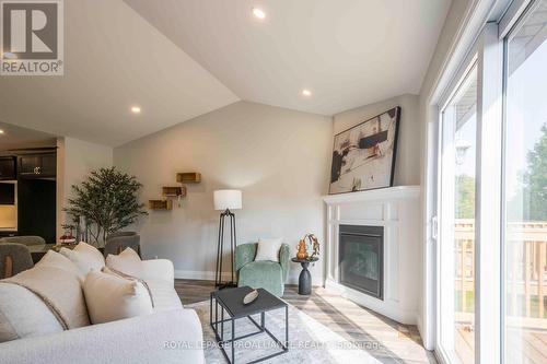 11 Clayton John Avenue, Brighton, ON - Indoor Photo Showing Living Room With Fireplace