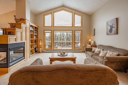 965 Oster Road, Golden, BC - Indoor Photo Showing Living Room With Fireplace