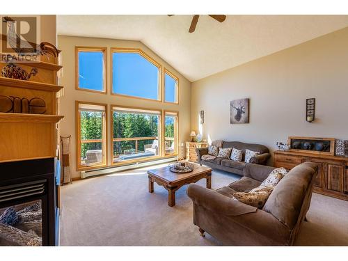 965 Oster Road, Golden, BC - Indoor Photo Showing Living Room With Fireplace