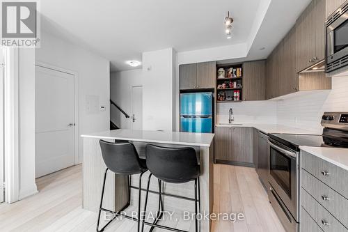 #215 -155 Downsview Park Blvd W, Toronto, ON - Indoor Photo Showing Kitchen With Upgraded Kitchen