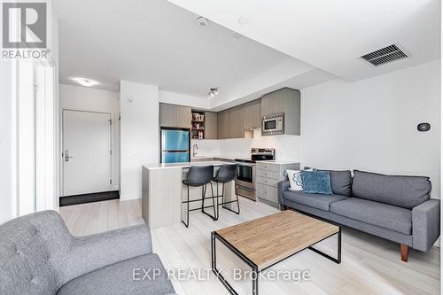 215 - 155 Downsview Park Boulevard W, Toronto, ON - Indoor Photo Showing Living Room