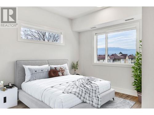 1220 Pacific Avenue Unit# 407, Kelowna, BC - Indoor Photo Showing Bedroom