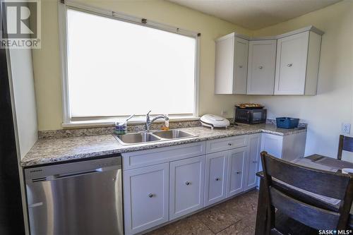 1162 107Th Street, North Battleford, SK - Indoor Photo Showing Kitchen With Double Sink