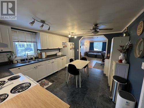 5307 43 Street, Fort Nelson, BC - Indoor Photo Showing Kitchen With Double Sink