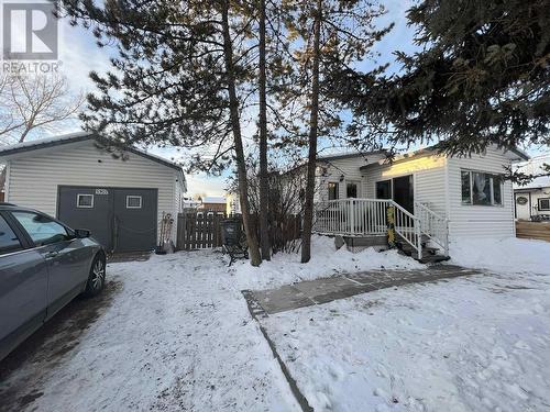 5307 43 Street, Fort Nelson, BC - Outdoor With Deck Patio Veranda With Exterior