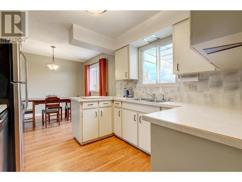 12241 Saunders Crescent, Summerland, BC - Indoor Photo Showing Kitchen With Double Sink