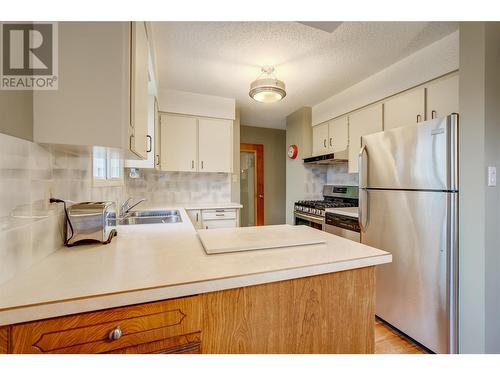 12241 Saunders Crescent, Summerland, BC - Indoor Photo Showing Kitchen With Double Sink