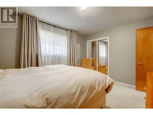 12241 Saunders Crescent, Summerland, BC - Indoor Photo Showing Bedroom