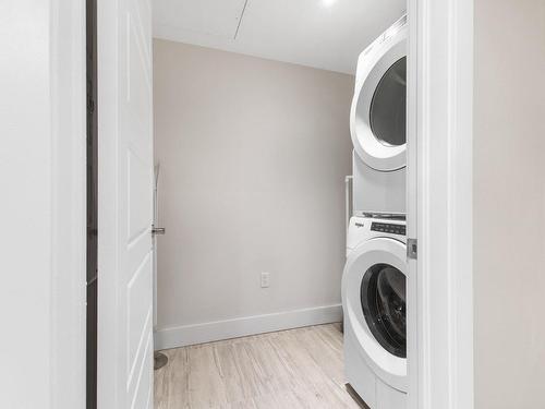 Salle de lavage - 452-11 Place De La Triade, Pointe-Claire, QC - Indoor Photo Showing Laundry Room