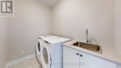88 Bearberry Rd, Springwater, ON - Indoor Photo Showing Laundry Room