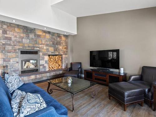 7922 Dean Road, Out Of District, BC - Indoor Photo Showing Living Room With Fireplace