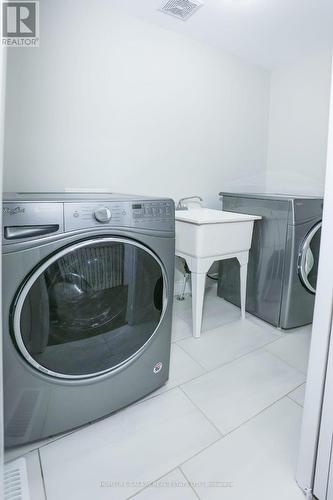 84 Alcorn Dr, Kawartha Lakes, ON - Indoor Photo Showing Laundry Room