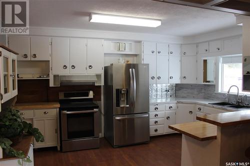 337 4Th Street, Estevan, SK - Indoor Photo Showing Kitchen With Stainless Steel Kitchen With Double Sink