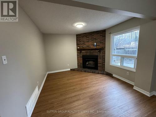 267 Riel Upper Unit Drive, Mississauga, ON - Indoor Photo Showing Living Room With Fireplace