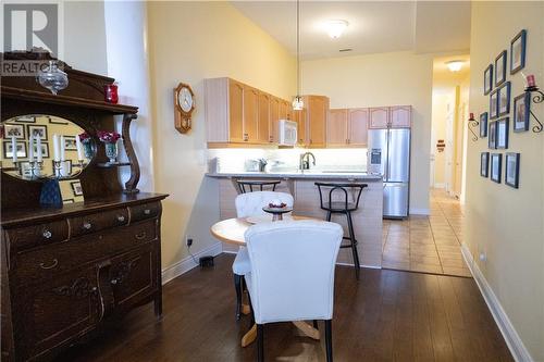Dining area with view of breakfast nook and into kitchen - 710 Cotton Mill Street Unit#206, Cornwall, ON - Indoor