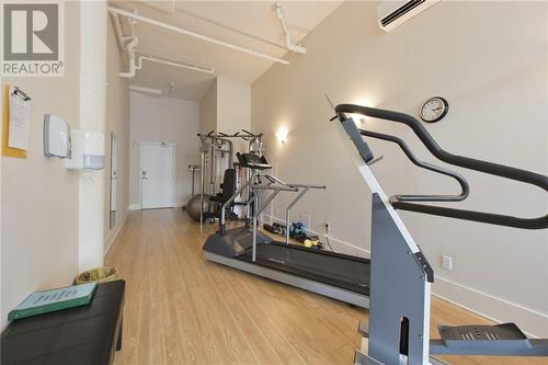 Fitness area within the condo building. - 710 Cotton Mill Street Unit#206, Cornwall, ON - Indoor Photo Showing Gym Room
