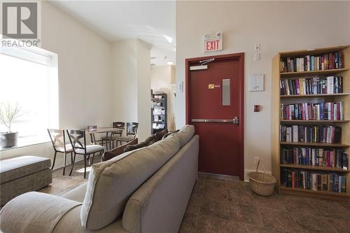 Library within the condo building. - 710 Cotton Mill Street Unit#206, Cornwall, ON - Indoor