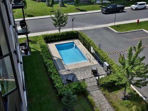 Piscine - 103-3630 Rue Roland-Marquette, Longueuil (Saint-Hubert), QC - Outdoor With In Ground Pool