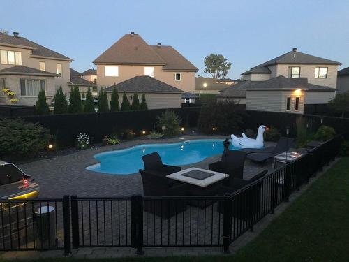 Pool - 85 Rue Des Arondelles, Varennes, QC - Outdoor With In Ground Pool With Backyard