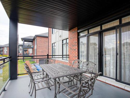 Balcony - 203-2305 Place Des Tilleuls, Saint-Bruno-De-Montarville, QC - Outdoor With Deck Patio Veranda With Exterior