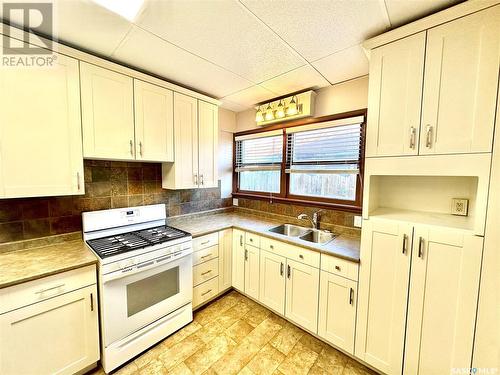 1372 98Th Street, North Battleford, SK - Indoor Photo Showing Kitchen With Double Sink