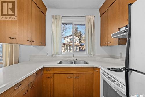 700 6Th Street E, Prince Albert, SK - Indoor Photo Showing Kitchen With Double Sink