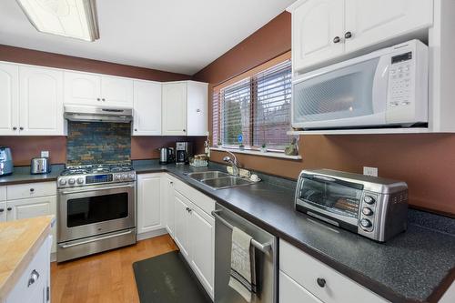 3306 4Th Avenue, Castlegar, BC - Indoor Photo Showing Kitchen With Double Sink