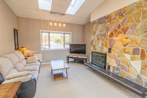 2819 Erickson Road, Erickson, BC - Indoor Photo Showing Living Room With Fireplace
