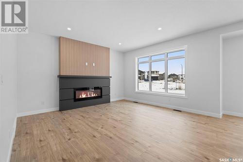 439 Schmeiser Bend, Saskatoon, SK - Indoor Photo Showing Living Room With Fireplace