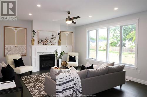 47 Belleview, Kingsville, ON - Indoor Photo Showing Living Room With Fireplace