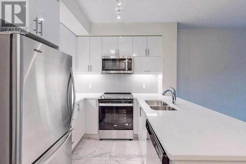 #221 -39 Annie Craig Dr, Toronto, ON - Indoor Photo Showing Kitchen With Stainless Steel Kitchen With Double Sink With Upgraded Kitchen