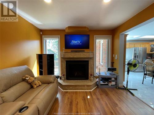 2645 Bridgeway Boulevard, Lasalle, ON - Indoor Photo Showing Living Room With Fireplace
