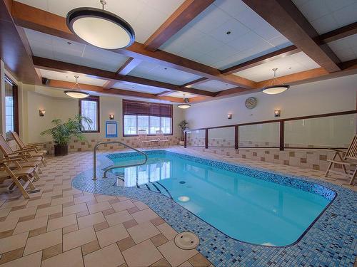 Pool - 302-6385 Mtée Ryan, Mont-Tremblant, QC - Indoor Photo Showing Other Room With In Ground Pool