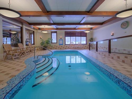 Pool - 302-6385 Mtée Ryan, Mont-Tremblant, QC - Indoor Photo Showing Other Room With In Ground Pool