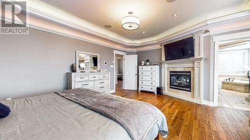 7 Kenai Crescent, St.John'S, NL - Indoor Photo Showing Bedroom With Fireplace