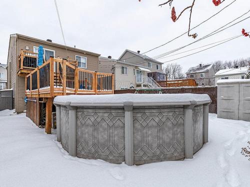 Backyard - 1061 Rue De Magellan, Laval (Fabreville), QC - Outdoor With Above Ground Pool