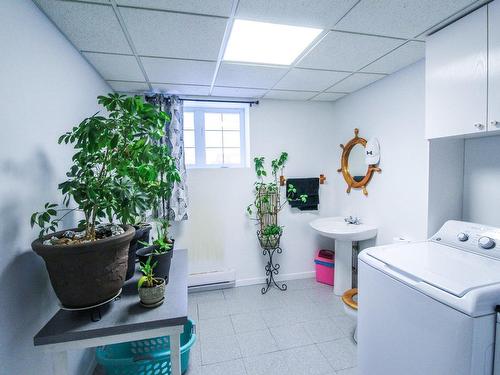 Powder room - 829 Ch. Central, Saint-Elzéar, QC - Indoor Photo Showing Laundry Room