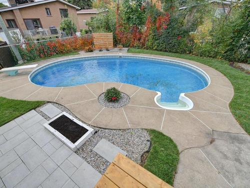 Cour - 1180 Rue De Montpellier, Laval (Duvernay), QC - Outdoor With In Ground Pool With Backyard