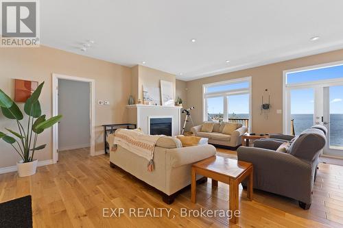 81 Beach Road, Tiny, ON - Indoor Photo Showing Living Room With Fireplace