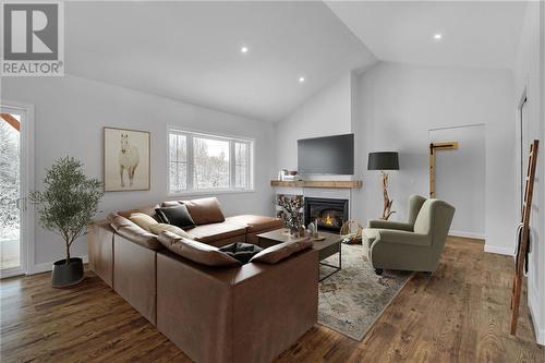 This picture has been virtually staged. - 15214 North Lunenburg Road W, Lunenburg, ON - Indoor Photo Showing Living Room With Fireplace