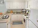 #205 -333 Rue Lafontaine Rd W, Tiny, ON  - Indoor Photo Showing Kitchen With Double Sink 