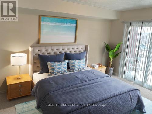 #205 -333 Rue Lafontaine Rd W, Tiny, ON - Indoor Photo Showing Bedroom