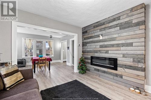 693-695 Partington, Windsor, ON - Indoor Photo Showing Living Room With Fireplace