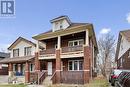 693-695 Partington, Windsor, ON  - Outdoor With Balcony With Facade 
