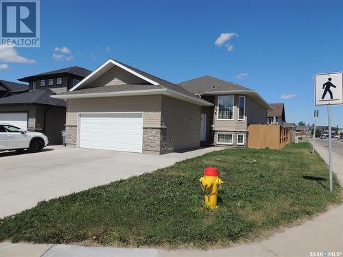 102 Hargreaves Green, Saskatoon, SK - Outdoor With Facade